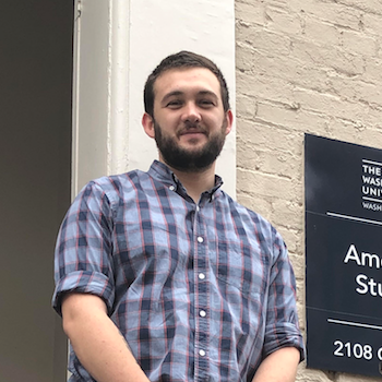 Joe LoyaconoBustos standing in front of the American Studies townhouse.