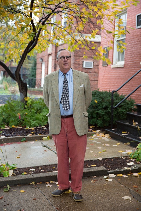 Richard Longstreth, professor of American Studies and director of the graduate program in historic preservation, stands in a drizzle outside the department's G Street townhouse