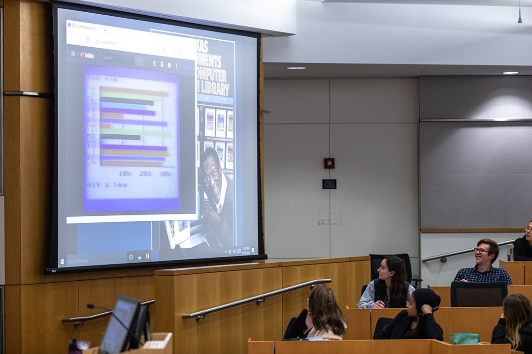 Students in American Studies class watching a youtube video on charts