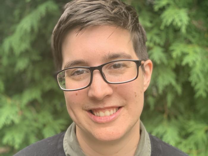 Headshot of PhD student Cam Cannon